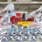 Роботизированная система гидроабразивной резки Fanuc M-710IC с двойной подставкой